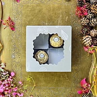 Light Green 4 Cavity Box With White Floral Pattern - best for chocolates and laddoo candles. Light Green 4 Cavity Box With White Floral Pattern - best for chocolates and laddoo candles.
