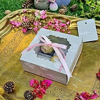 Light Green 4 Cavity Box With White Floral Pattern - best for chocolates and laddoo candles. Light Green 4 Cavity Box With White Floral Pattern - best for chocolates and laddoo candles.