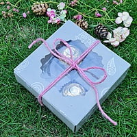 Light Green 4 Cavity Box With White Floral Pattern - best for chocolates and laddoo candles. Light Green 4 Cavity Box With White Floral Pattern - best for chocolates and laddoo candles.
