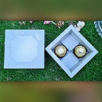 Light Green 4 Cavity Box With White Floral Pattern - best for chocolates and laddoo candles. Light Green 4 Cavity Box With White Floral Pattern - best for chocolates and laddoo candles.