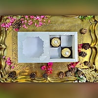 Light Green 4 Cavity Box With White Floral Pattern - best for chocolates and laddoo candles. Light Green 4 Cavity Box With White Floral Pattern - best for chocolates and laddoo candles.