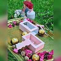 Light Pink 2 Cavity Box With White Floral Pattern - best for chocolates and laddoo candles. Light Pink 2 Cavity Box With White Floral Pattern - best for chocolates and laddoo candles.